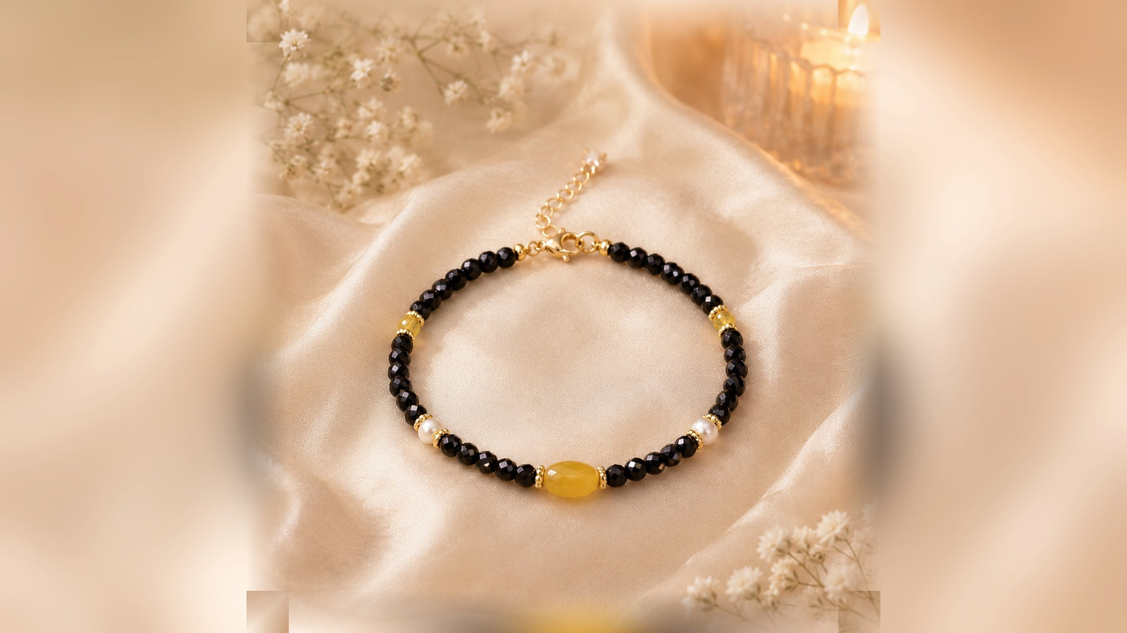 The Obsidian Sun black gemstone and citrine bracelet on warm silk