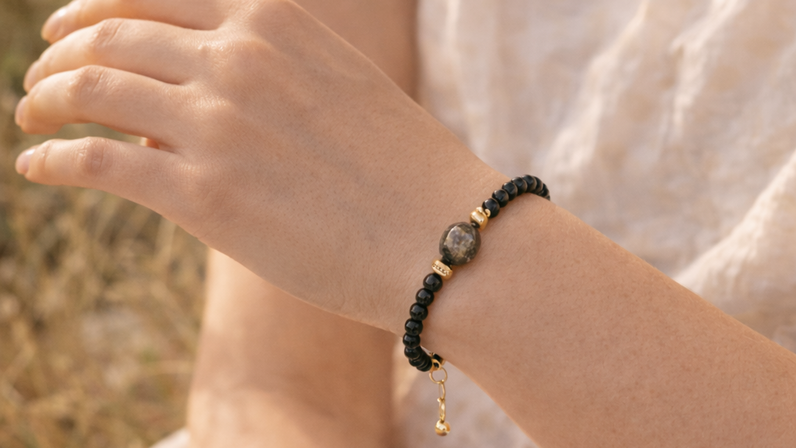 The Shadow Anchor black gemstone bracelet as grounding jewelry for steady energy