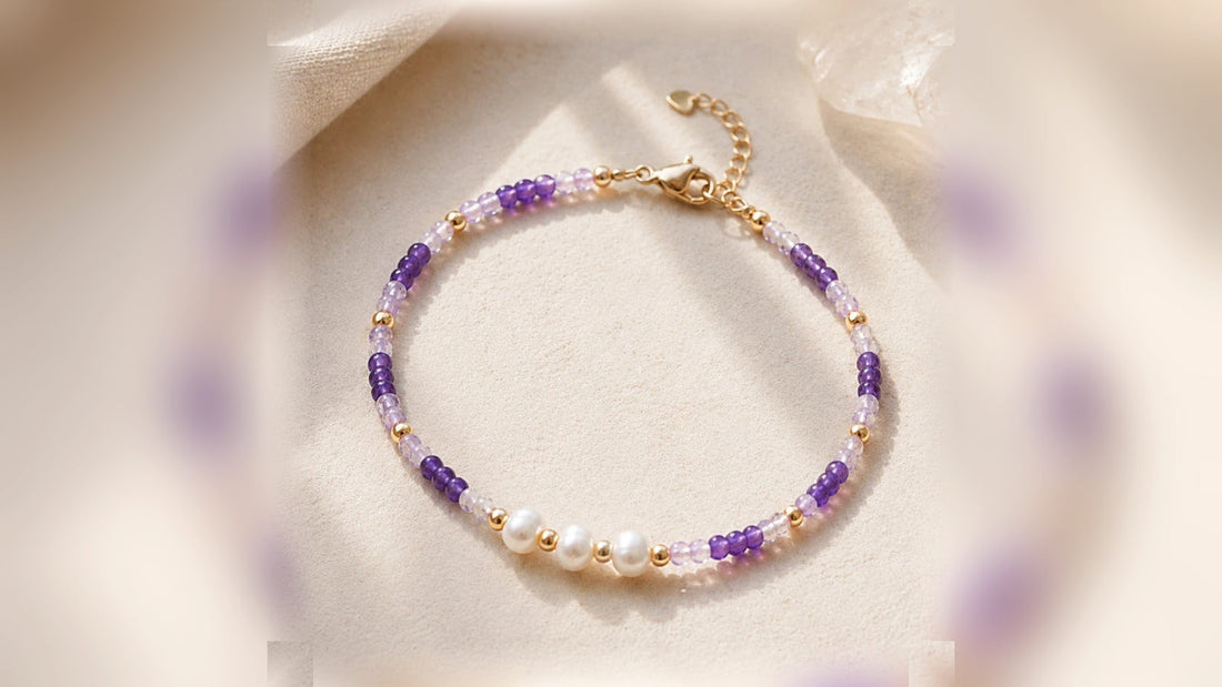 The Violet Whisper purple gemstone and pearl bracelet on soft fabric