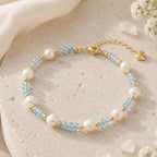 The Aqua Serenity Natural Aquamarine and Freshwater Pearl bracelet for calm and clarity, close-up detail image