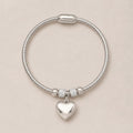 The Lunessa Heart silver-tone heart charm bracelet for self-love and tenderness, main product image