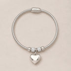 The Lunessa Heart silver-tone heart charm bracelet for self-love and tenderness, main product image