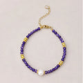 The Plum Serenity purple Natural Stone bracelet with Freshwater Pearl center and gold-tone clasp