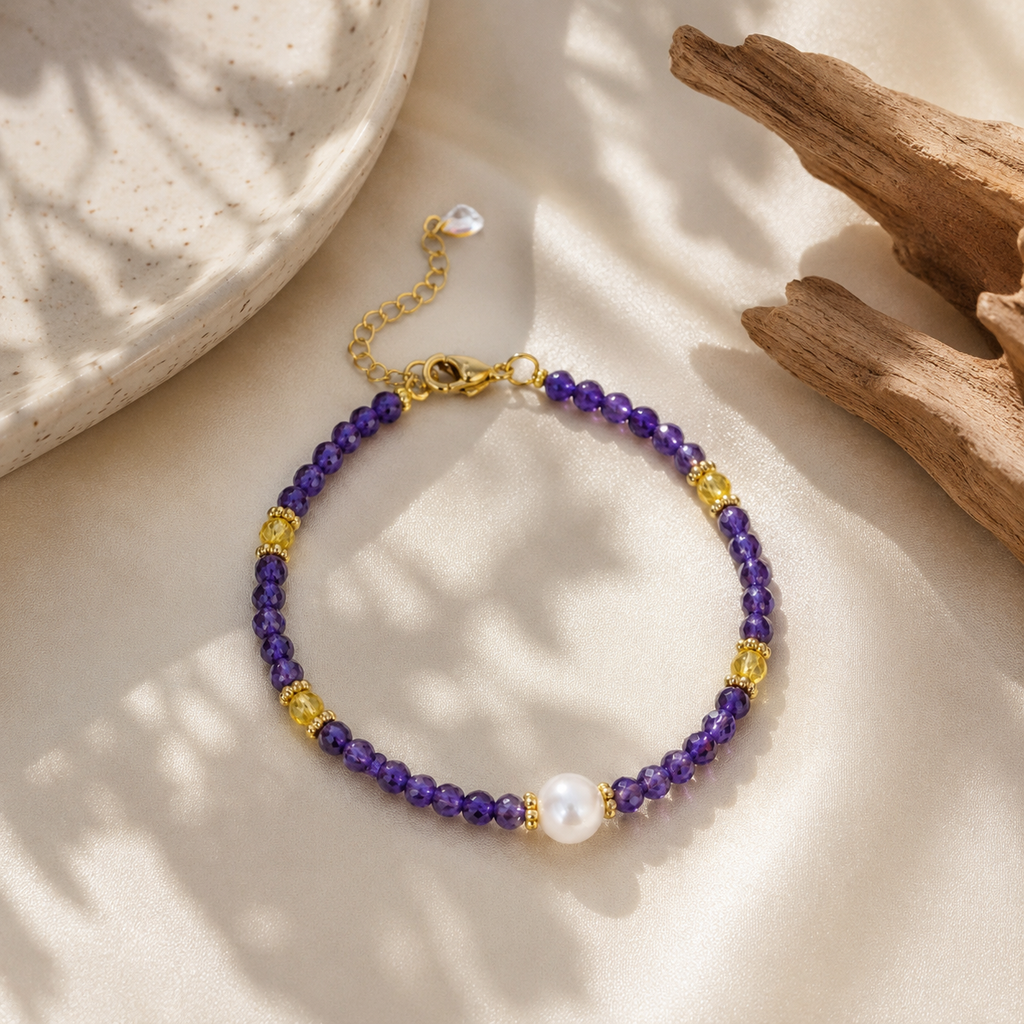 The Plum Serenity purple Natural Stone bracelet with Freshwater Pearl bead and crystal charm on satin